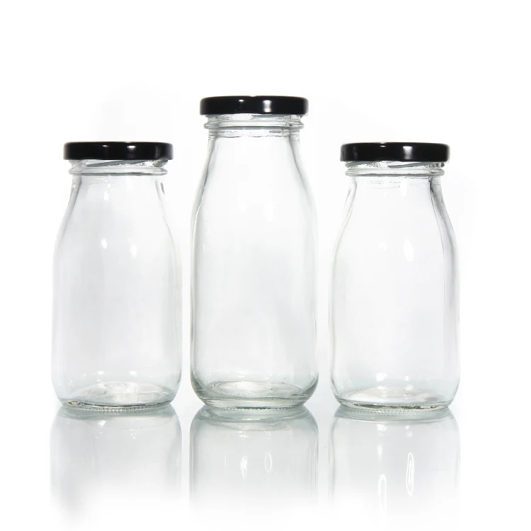 Stocked Cheaper Price Round Clear Milk Bottle Glass for Juice Beverage Packaging