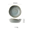 Piatto in ceramica smaltata blu con motivo di fiori di pruno