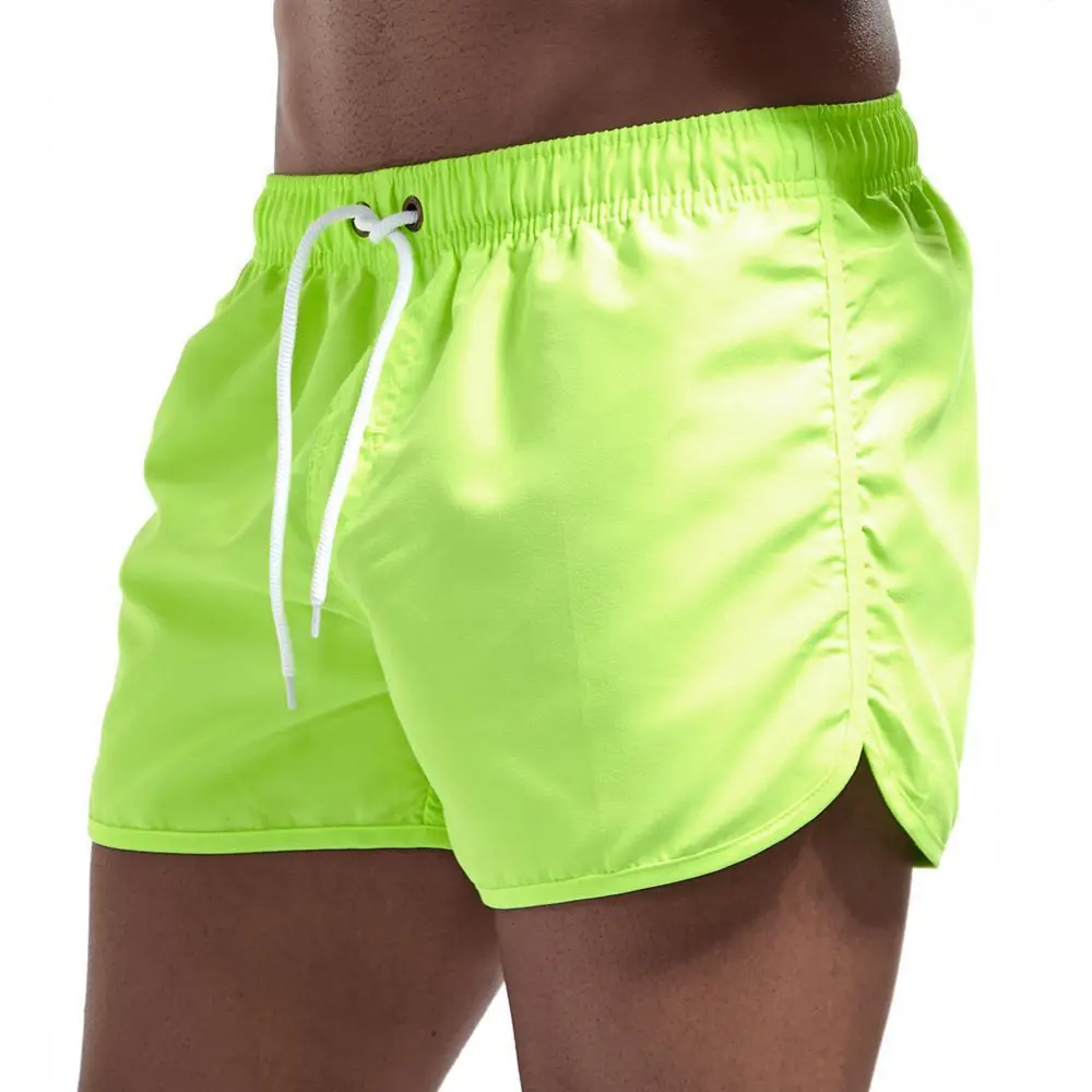 Men's Solid four-point Beach Swimming Pants Fashion Multi color Polyester Board Shorts Straight Loose Sports Shorts855_voghion.com