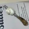 white7 Moonlight Snail Butter Knife