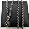 Dice cross pendant with alphabet chain