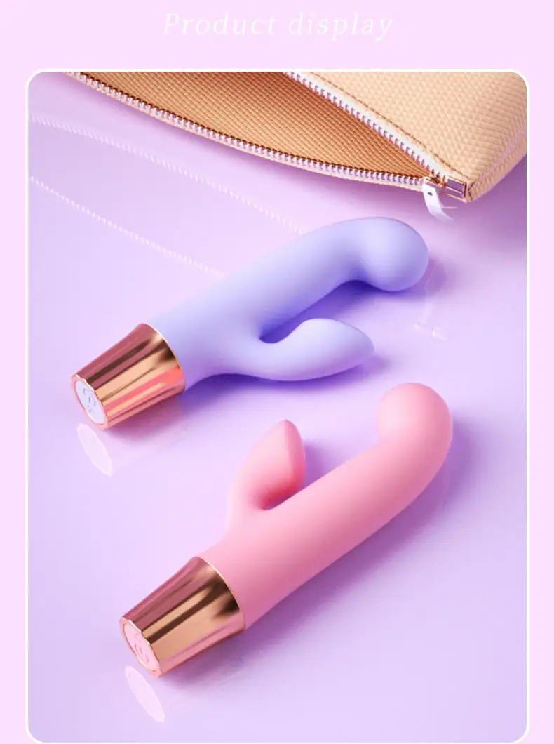 Compact portable G-Spot Vibrator next to USB charging cable
