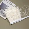 Bordure en plumes déchirées sur un seul côté, longueur des cheveux 13-18 cm