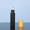 Black ball-shaped bottle