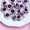 Perline nere - fiori rosa, viola, crema e bianchi