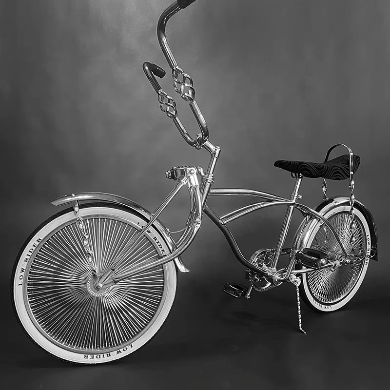 chicano lowrider bicycle 16 speed KT coaster brakes for reliable stopping power and an alloy FAT rim with 2.5 inch front and 3 inch rear tires for added comfort and stability Lowrider Bikes: Familia y Cultura