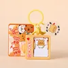 Adorabile portachiavi flipbook per animali domestici - Butter Bear