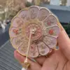Espejo de bolsillo de doce diosas de las flores.