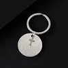 Silver brushed  round key +Silver cross