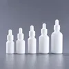 Botella blanca con tapa blanca