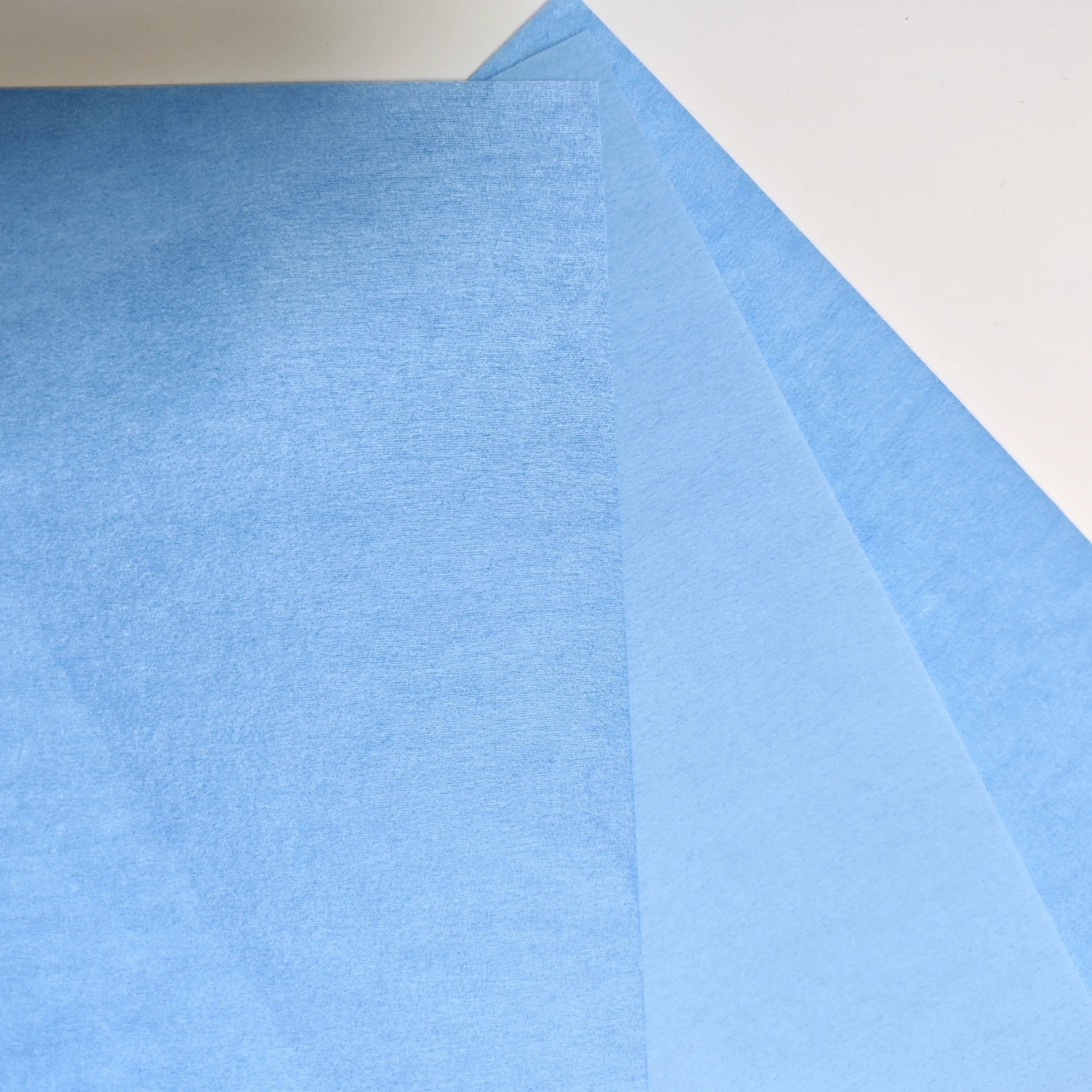 Anti-static Cost Efficient Breathable Medical Spunlace Nonwoven PET Viscose Laminated PE Film Fabric Surgical Gown Bed Sheet