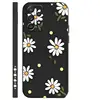 Noir élégant avec des feuilles vertes et des fleurs blanches