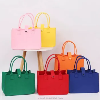 The new hot sales simple buckle multi-color optional large capacity ladies go to work to carry out hand bag