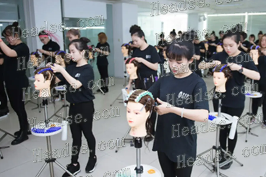 Professional hairdressing instruction recommends head models