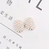 D1590 pearl bow-gold