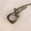 Montre collier style guitare en bronze