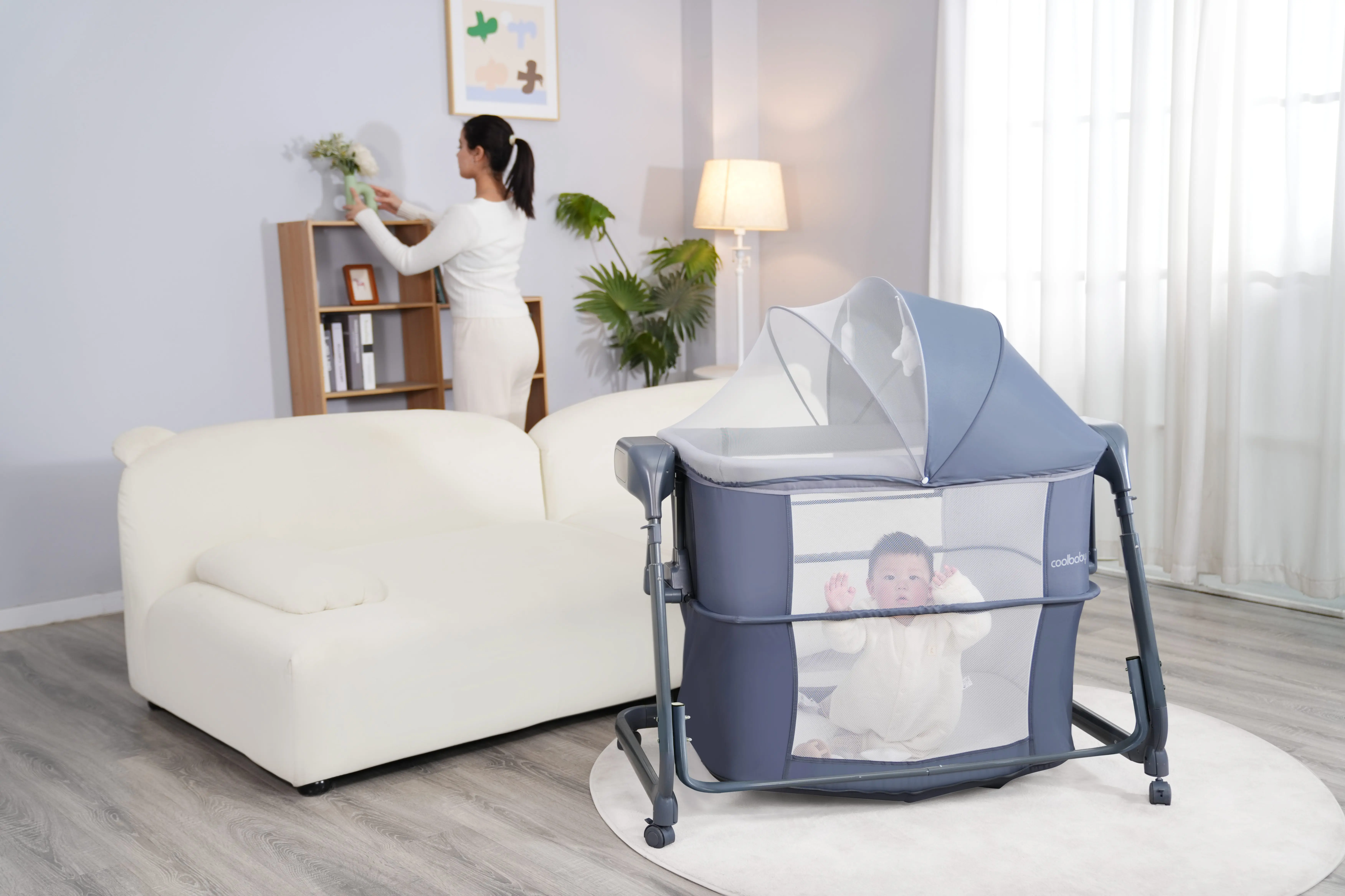 P765D Cool Baby New Auto Swing Electric Baby Bassinet with One Side Can Be Opened manufacture