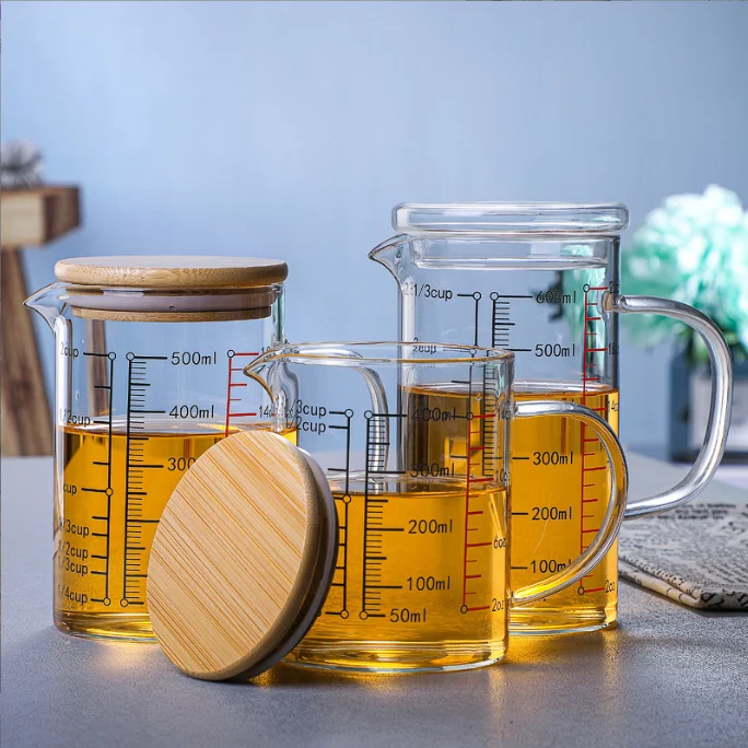 Wholesale 500/1000ML High Borosilicate Heat Resistant Glass Measuring Cup,  Kitchen Measuring Cups with lid From m.