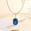 Blue pointed crystal pendant with light chain