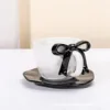 Black bow cup and saucer set