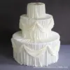 Tabla de leche blanca cubierta de mesa de seda con el modelado de auto-encuadernación...