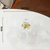 Tocadiscos de cristal dorado transparente