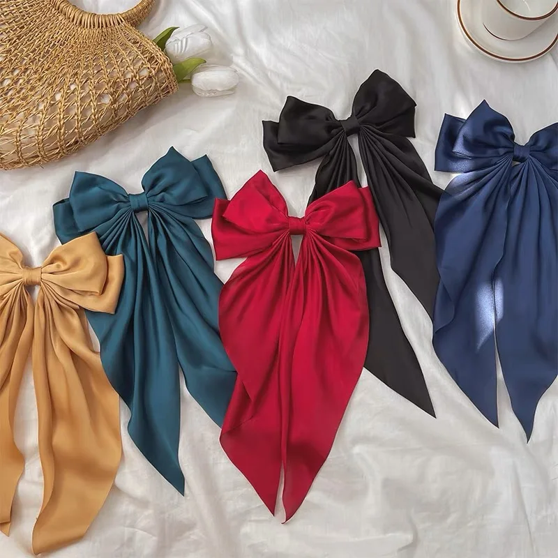 BOW-KNOT HAIR CLIP IN EGG SHELL SILK 358294 main image 0
