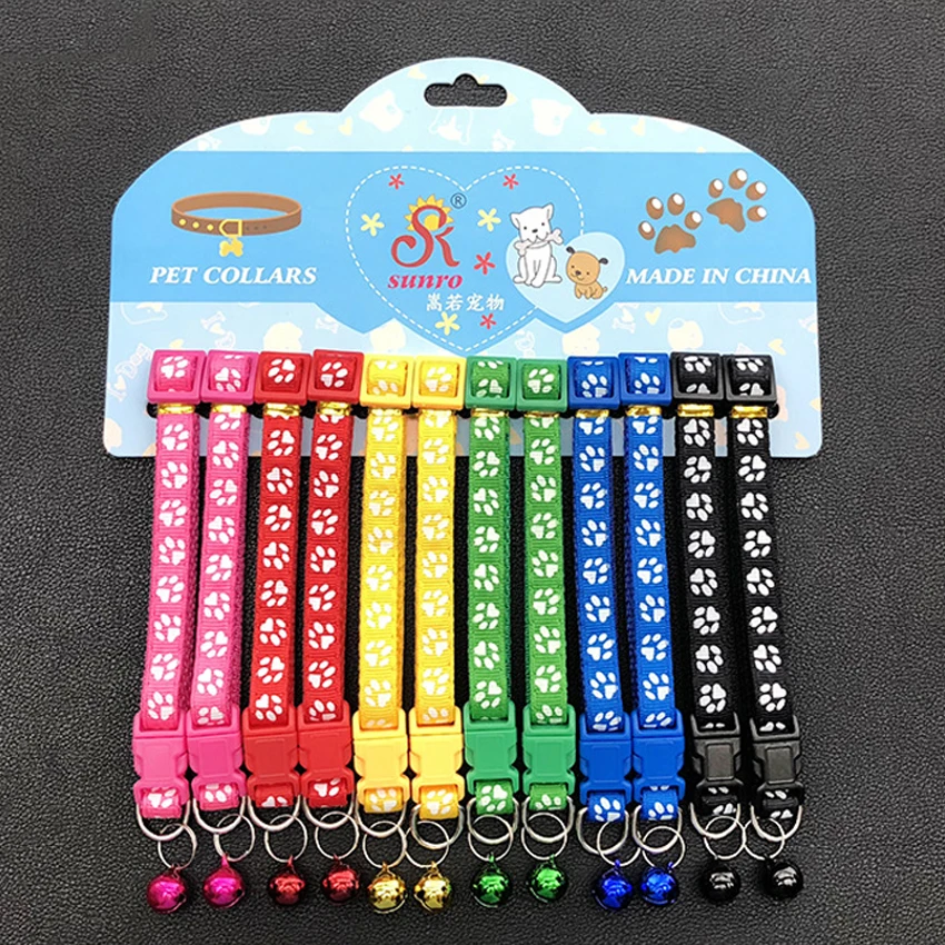 Adjustable Nylon Dog Collar with Quick Release Buckle Durable Paw Pattern Print Bell and Breakaway Design for Pets