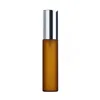 Frosted amber glass bottle + silver cap