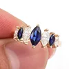 14k gold lab sapphire moissanite ring