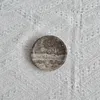Diámetro 10, altura 2 cm, mármol color gris plata.
