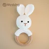 Campana de mano de conejo blanco