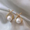 2 cross pearl stud earrings