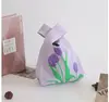 Four purple tulips