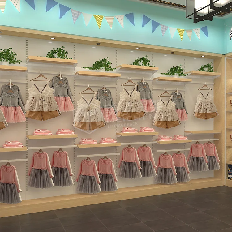 Meicheng Simple Shop Counter Design Store Counter Kids Clothing Store Interior Design With Lighting
