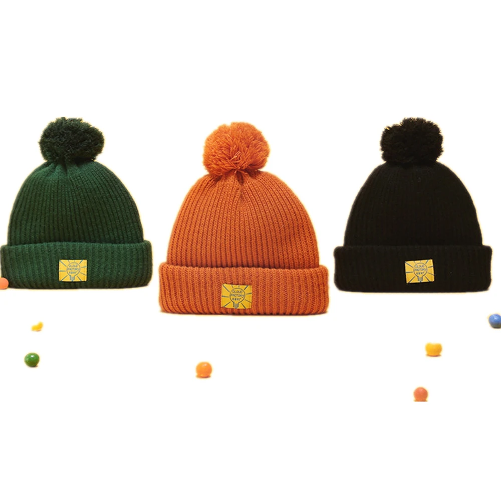 Source hats with ball on top/ custom puffball winter hat/ blank beanie hat with ball top on m.alibaba.com