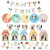 Décoration de fête sur le thème des chiots colorés