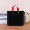 Black with red handle