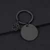 Llavero circular de 30 mm con garra de gato hueca (Negro)