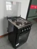 Forno a 2 gas, 2 elettrici con pentole.