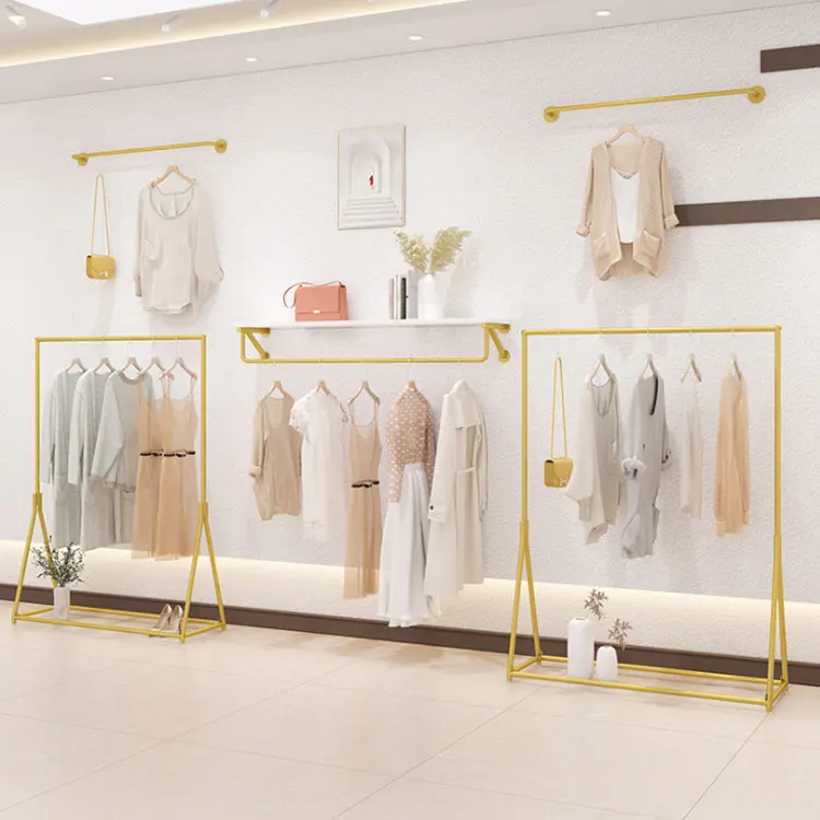 boutique gold clothing display stand wall