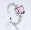 White ring purple stone