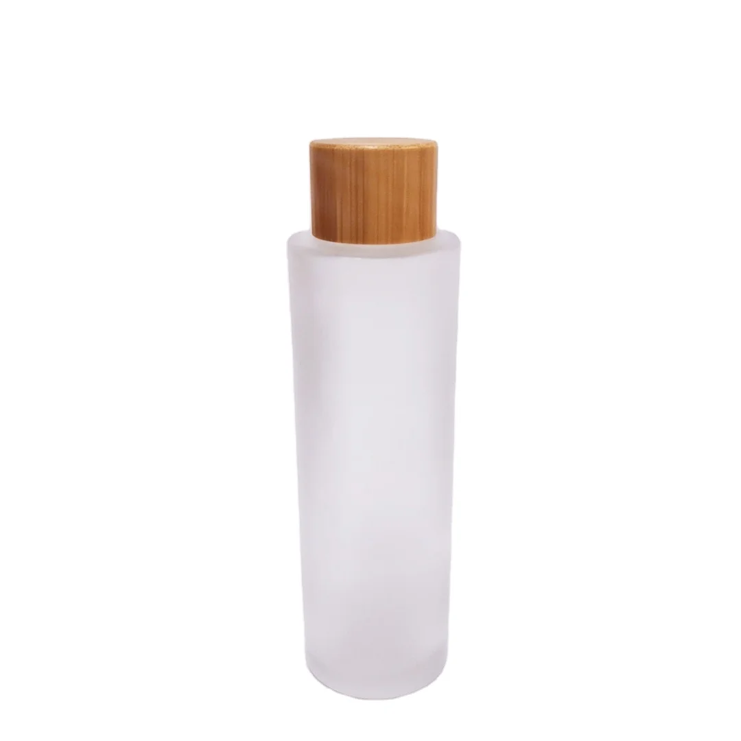 Eco Friendly 20ml Empty Round Liquid Packaging Container Frosted Glass Packaging Spray Bottle With Bamboo Pump Sprayer