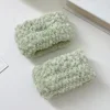 One green pineapple-patterned wristband