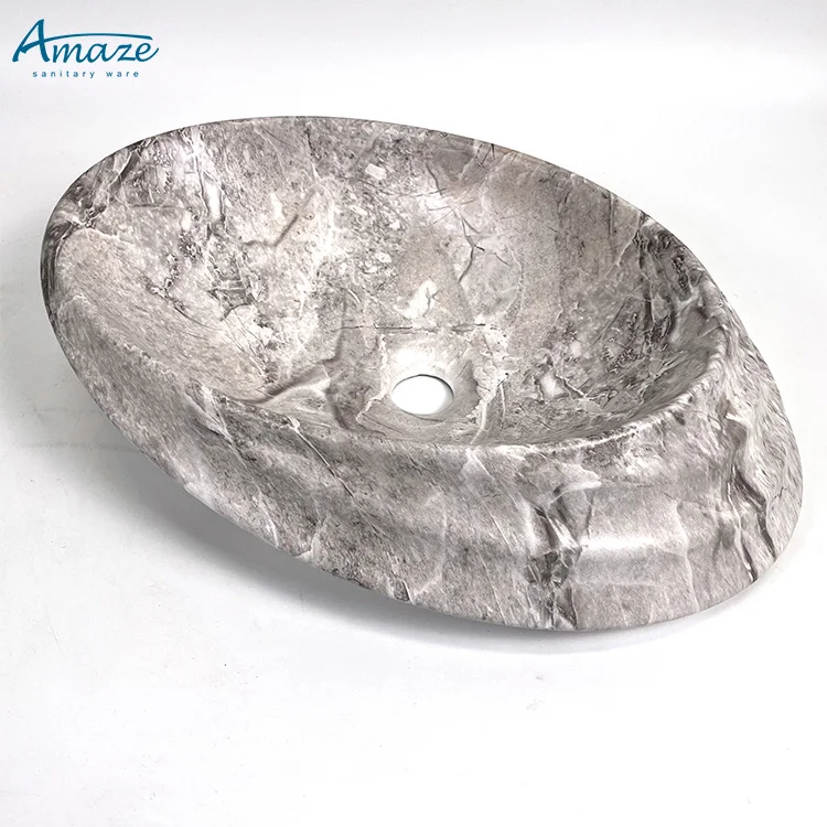 Hotel good quality luxury ceramic washbasin oval marble design bathroom sink hand wash basin manufacture