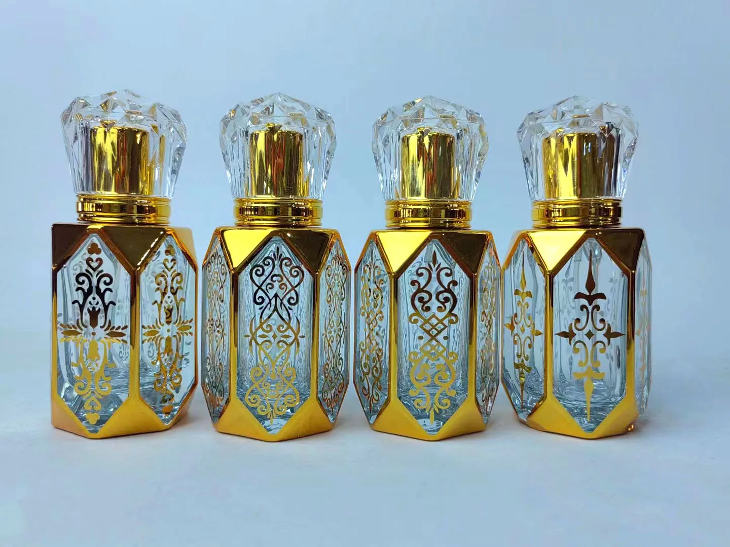 product 30ml 50ml 60ml dubai high quality uv engraved octagonal bottle gold glass perfume special shaped empty attar oud bottle-27