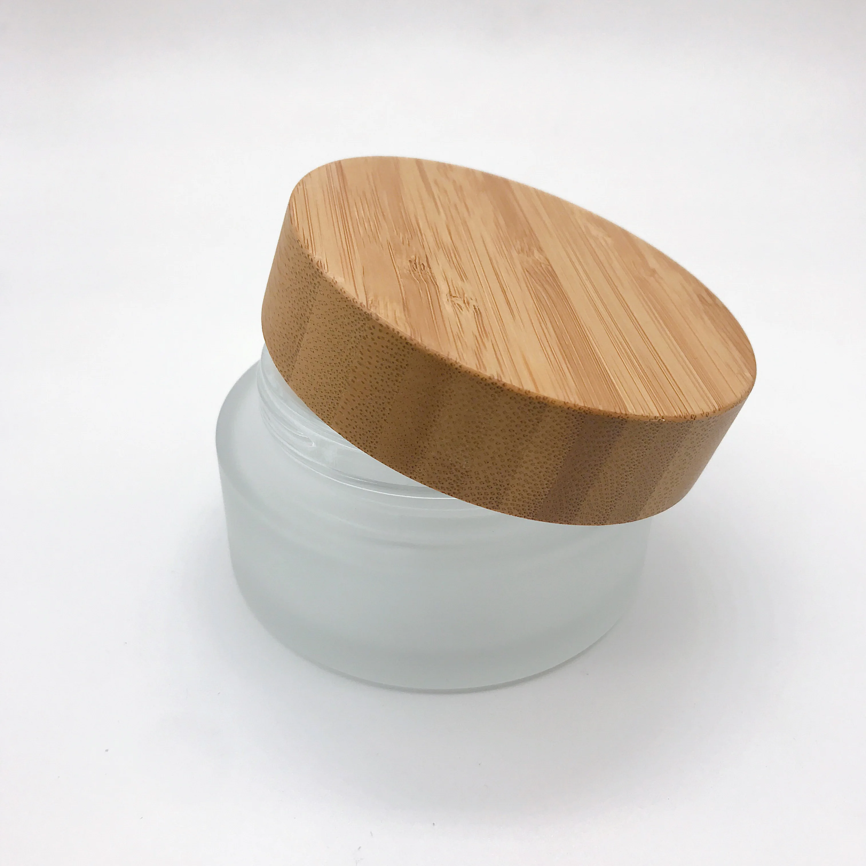Customized Thick Bottom Small 5G 20G 30G 50G 100 Ml 200Ml Cosmetic Wooden Wood Bamboo Lids Cap Cosmetic Frosted Clear Glass Jars