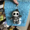 Pendentif tête de mort-9-11cm 25g trois standards plus sac à poussière