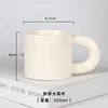 Cream-colored chubby cup print