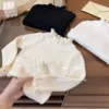 Maglione lavorato a maglia beige